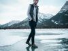 Man On Ice With Mountains Behind
